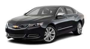 A black 2020 Chevy Impala is facing left.