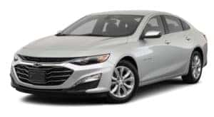 A silver 2020 Chevy Malibu is facing left.