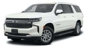 A 2021 Chevy Suburban is angled left.