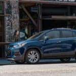 A blue 2020 Chevy Trax is parked in front of a Buford, GA, restaurant.