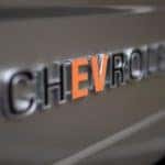 The black and silver badging on the 2019 SEMA Blazer-E concept build is shown with the 'EV' in orange.
