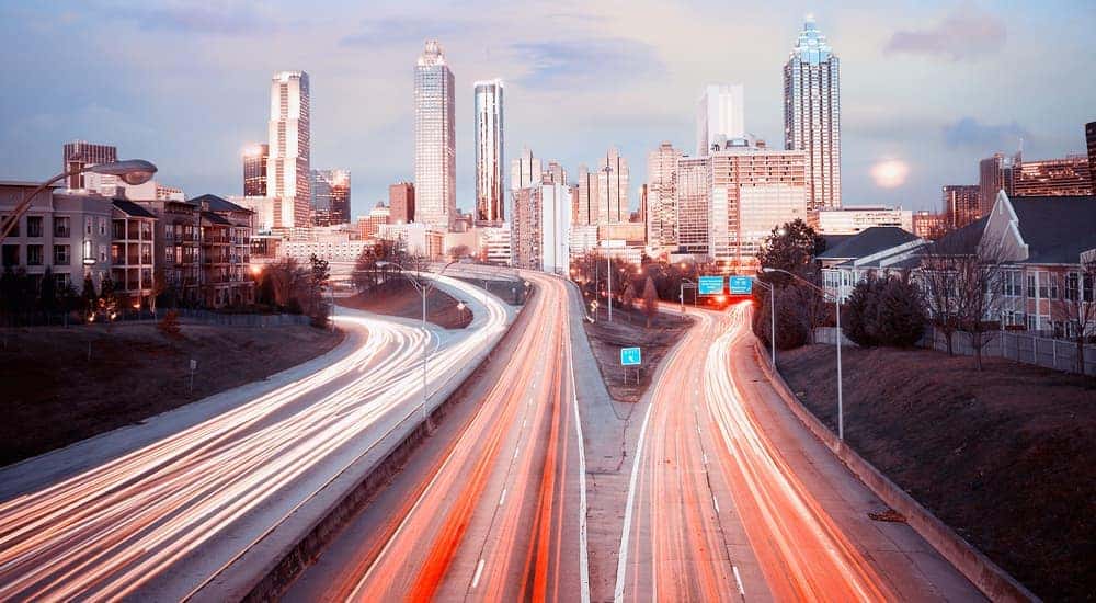 Blurred car lights are on the highway in Atlanta, GA.