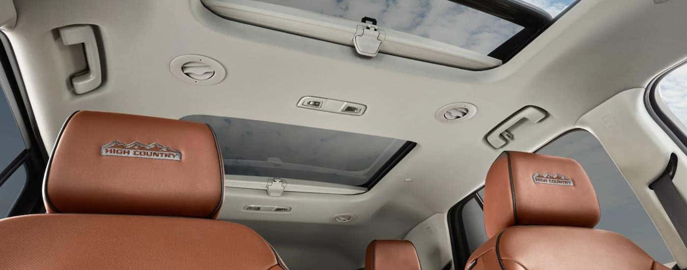 The tan interior and brown seats are shown from a low angle in the 2021 Chevy Traverse High Country.