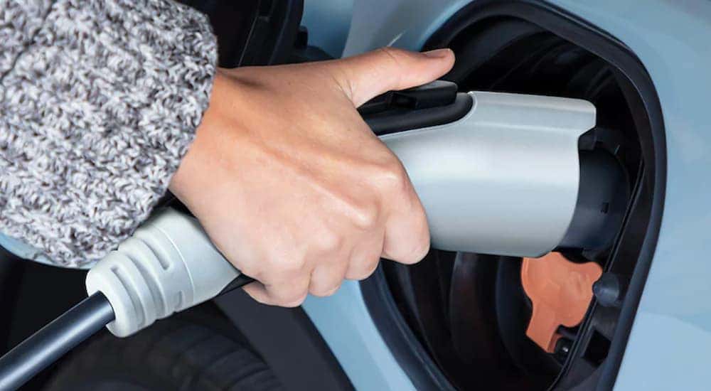 A Chevy EV is shown charging.