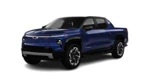 A blue 2024 Chevy Silverado 1500 EV is facing left.
