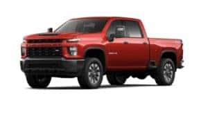A red 2022 Chevy Silverado 2500 HD Custom is angled left.