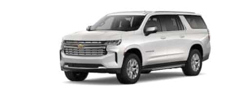 A white 2022 Chevy Suburban is angled left.