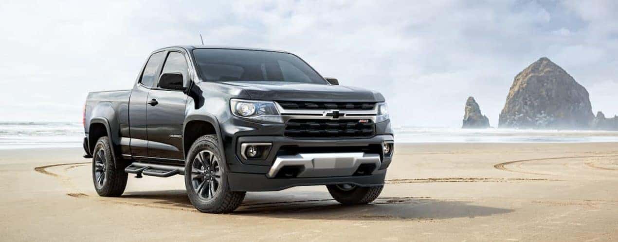 A grey 2022 Chevy Colorado Z71 is shown parked on the beach.