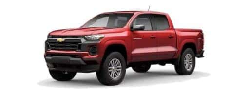 A red 2023 Chevy Colorado is angled left.