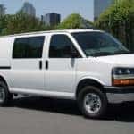 A white 2016 Chevy Express is shown from the side.