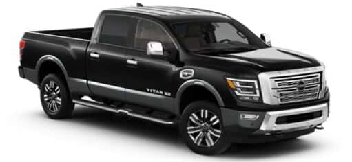 A black 2023 Nissan Titan XD is shown angled right.