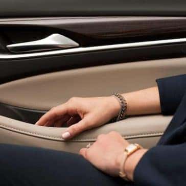 Woman's arm against the interior door of a 2019 Buick Enclave