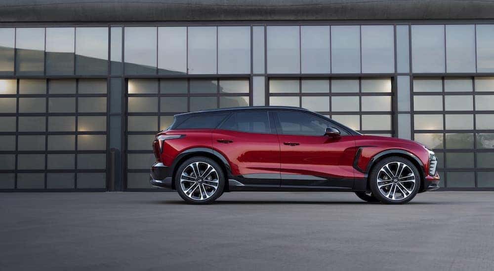 Side view of a red 2024 Chevy Blazer EV parked after leaving a Stanley Chevy dealer