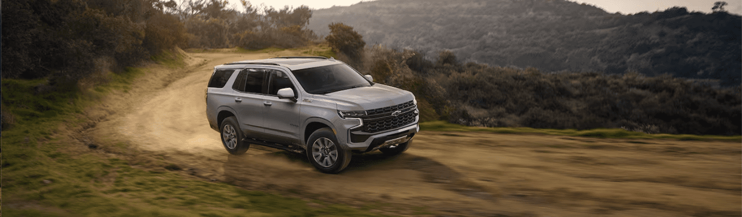 2024-chevy-tahoe-in-summit-white 2024 Chevy Tahoe in Summit White in an off-road setting