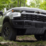 Front view of the 2024 Chevy Silverado 1500 ZR2 Bison in a forest setting