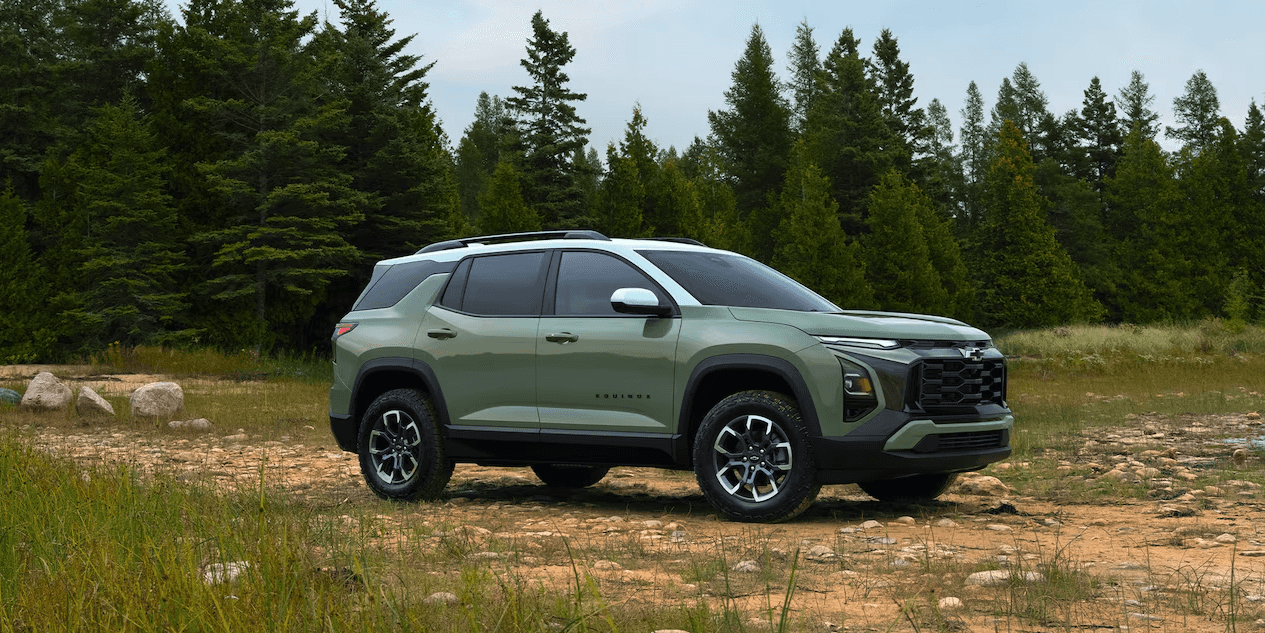 Side profile of the 2025 Chevy Equinox with trees in the background