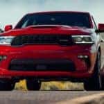 A red 2022 Dodge Durango is shown from the front on the road.