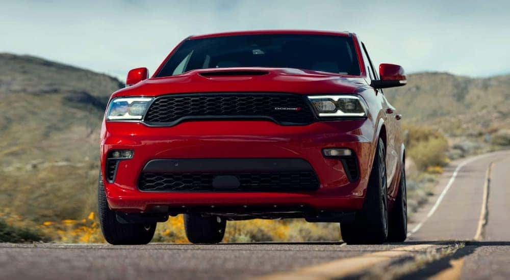 A red 2022 Dodge Durango is shown from the front on the road.