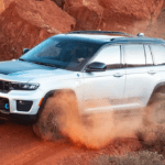 2024 Jeep Grand Cherokee Trailhawk 4xe driving off-road