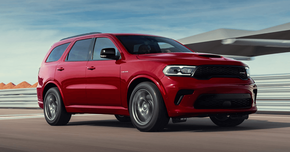 A red 2025 Dodge Durango driving down the road