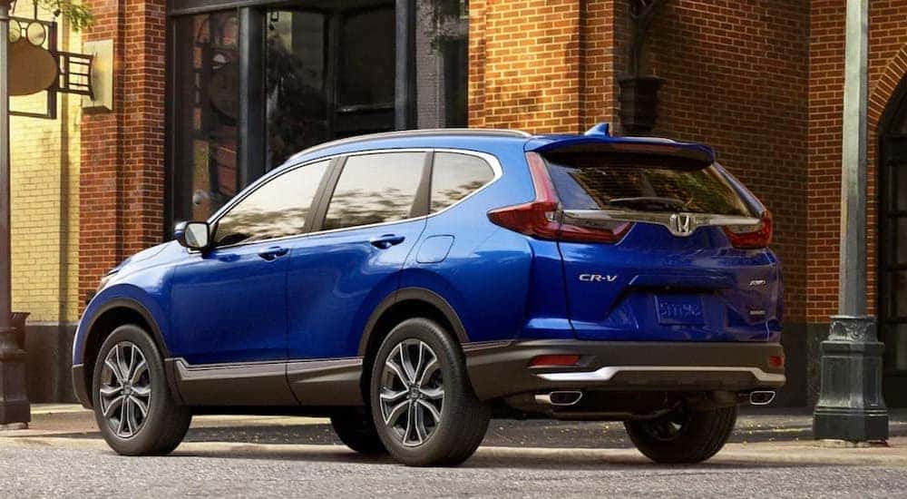 A blue 2022 Honda CR-V is shown from the rear at an angle.