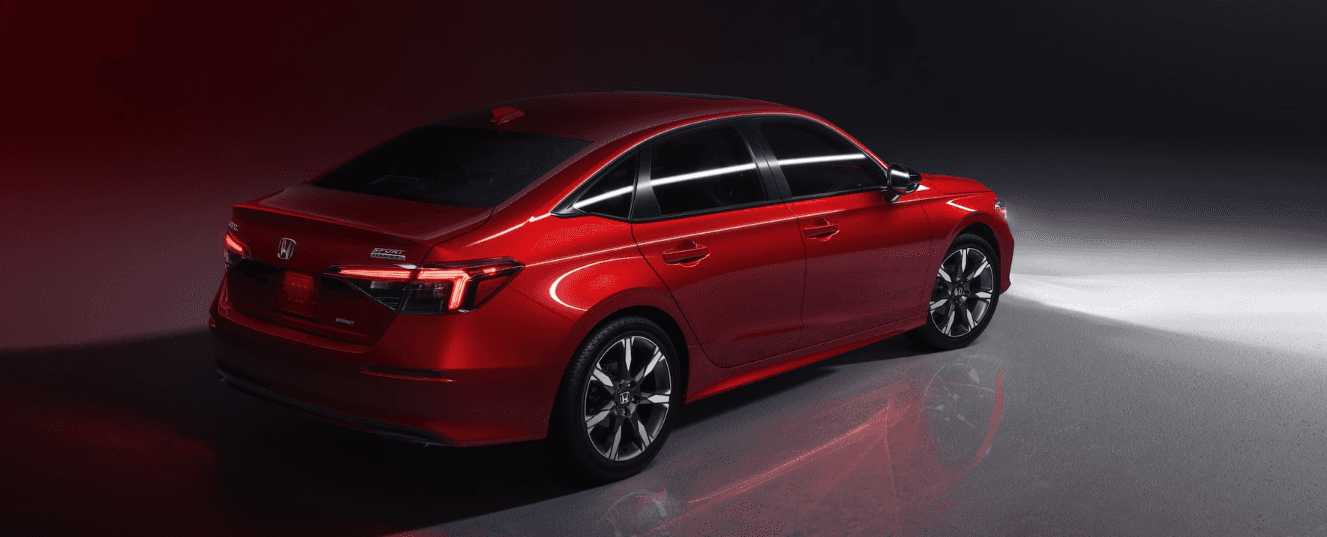 Side and rear view of the 2025 Honda Civic in Rallye Red