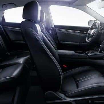 Side view of black leather seats inside a 2019 Honda Civic