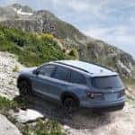A grey 2022 Honda Pilot Trailsport is shown from the rear at a high angle.