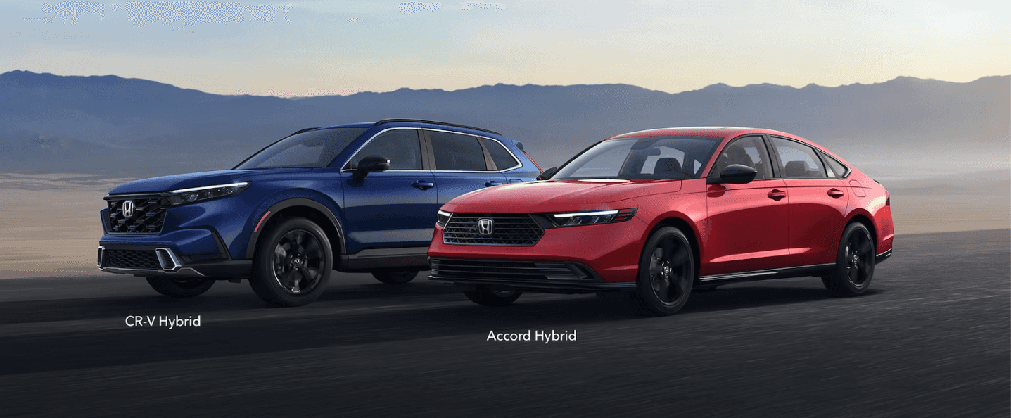 2024 Honda Accord Hybrid Touring next to a 2023 CR-V Sport Touring Hybrid