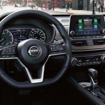 Dashboard and steering wheel inside a 2020 Nissan Altima for sale
