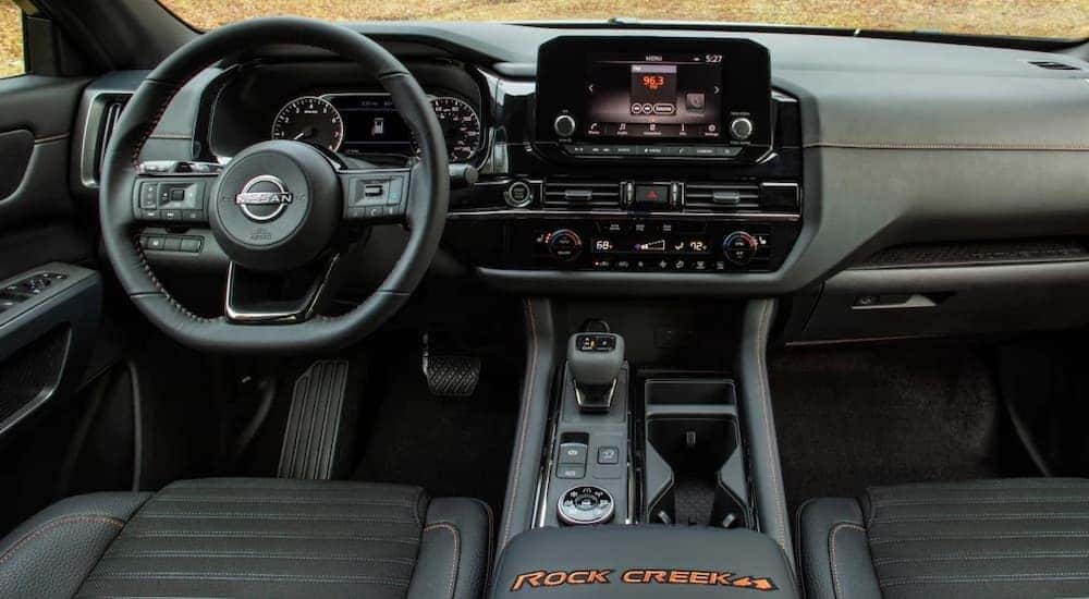 The interior of a 2023 Nissan Pathfinder Rock Creek is shown from above the center console.