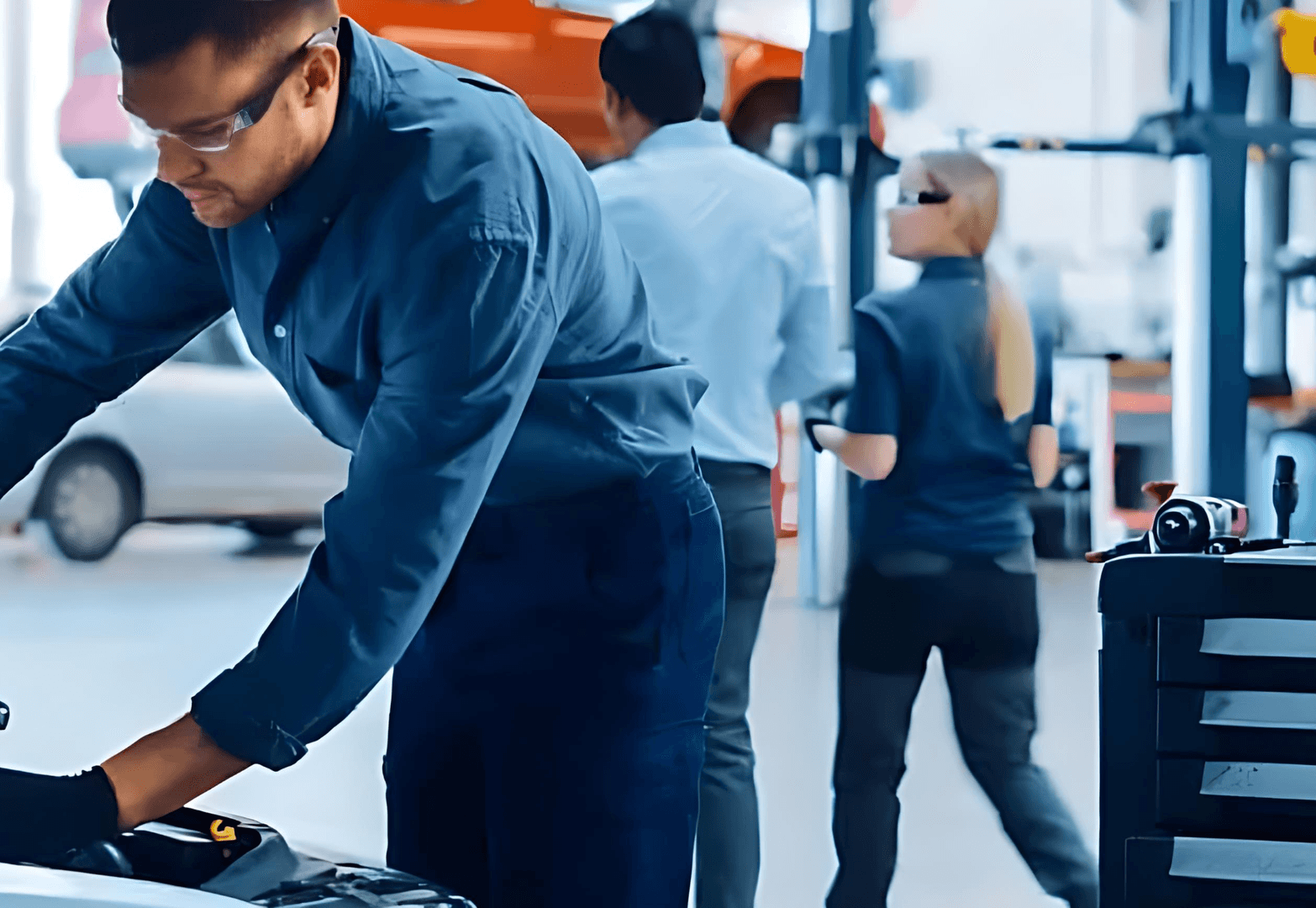 Service Technician working on vehicle.