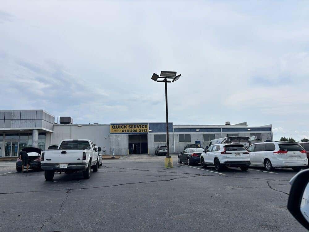 Quick Service by Serra Honda storefront and parking lot