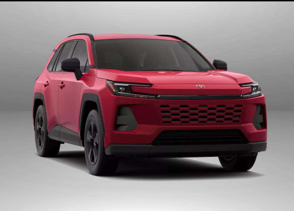 2026 Toyota RAV4 LE with sleek modern design and a black grille viewed from the front at an angle.