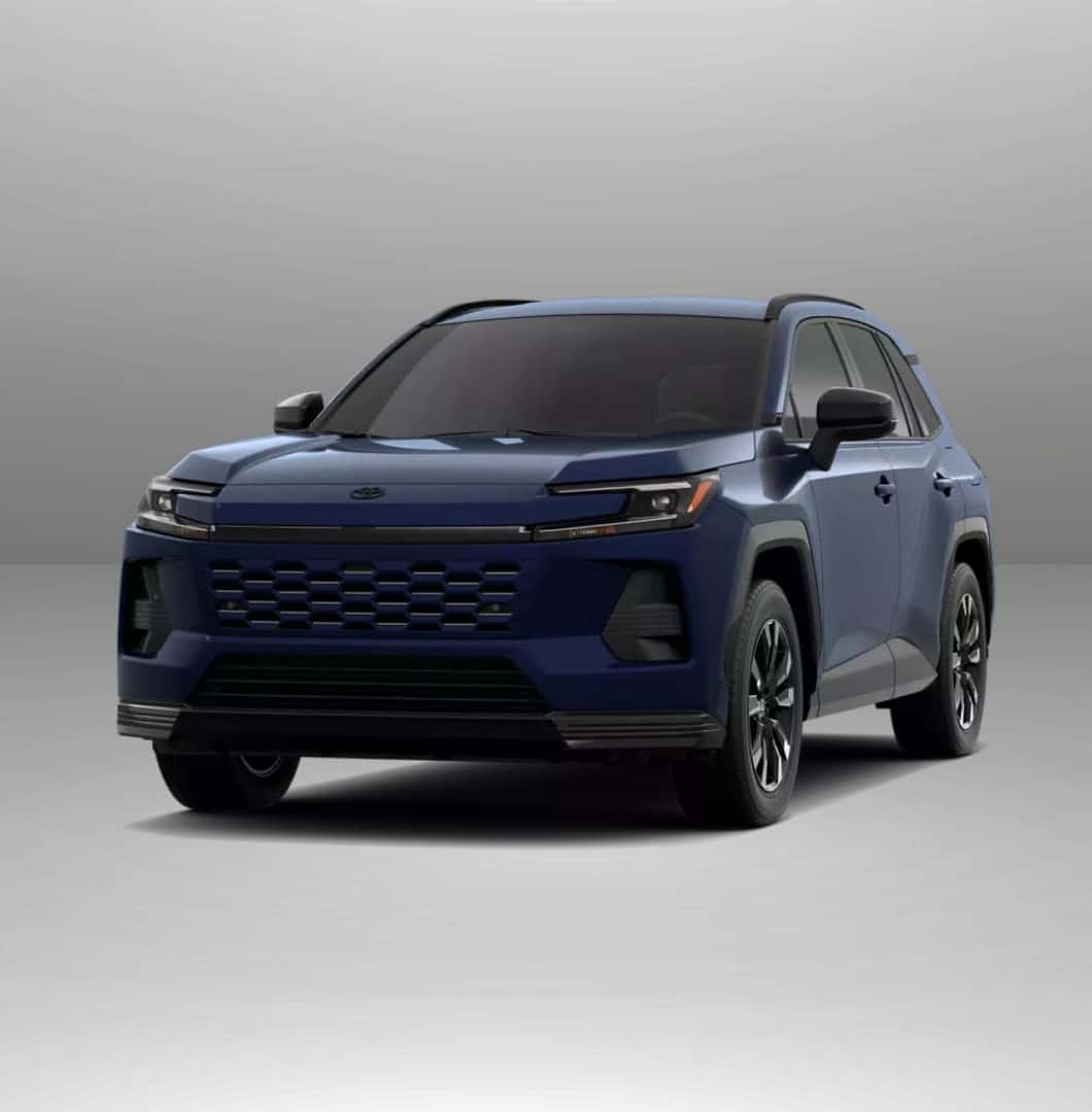 2026 Toyota RAV4 SE is shown against a neutral gray background.