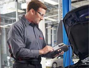 A person using a diagnostic tool
