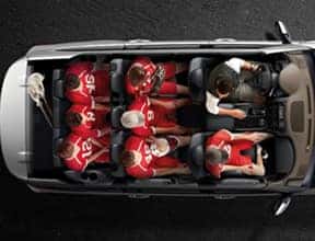  group of people in a car with roof removed