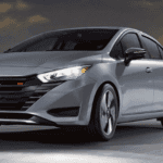 A gray car driving on a highway