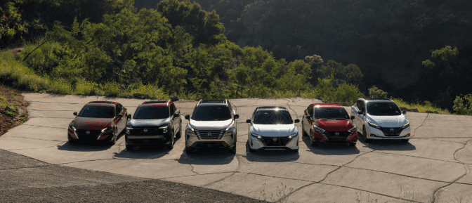 : A group of cars parked in a parking lot