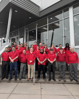 A group of people in red shirts