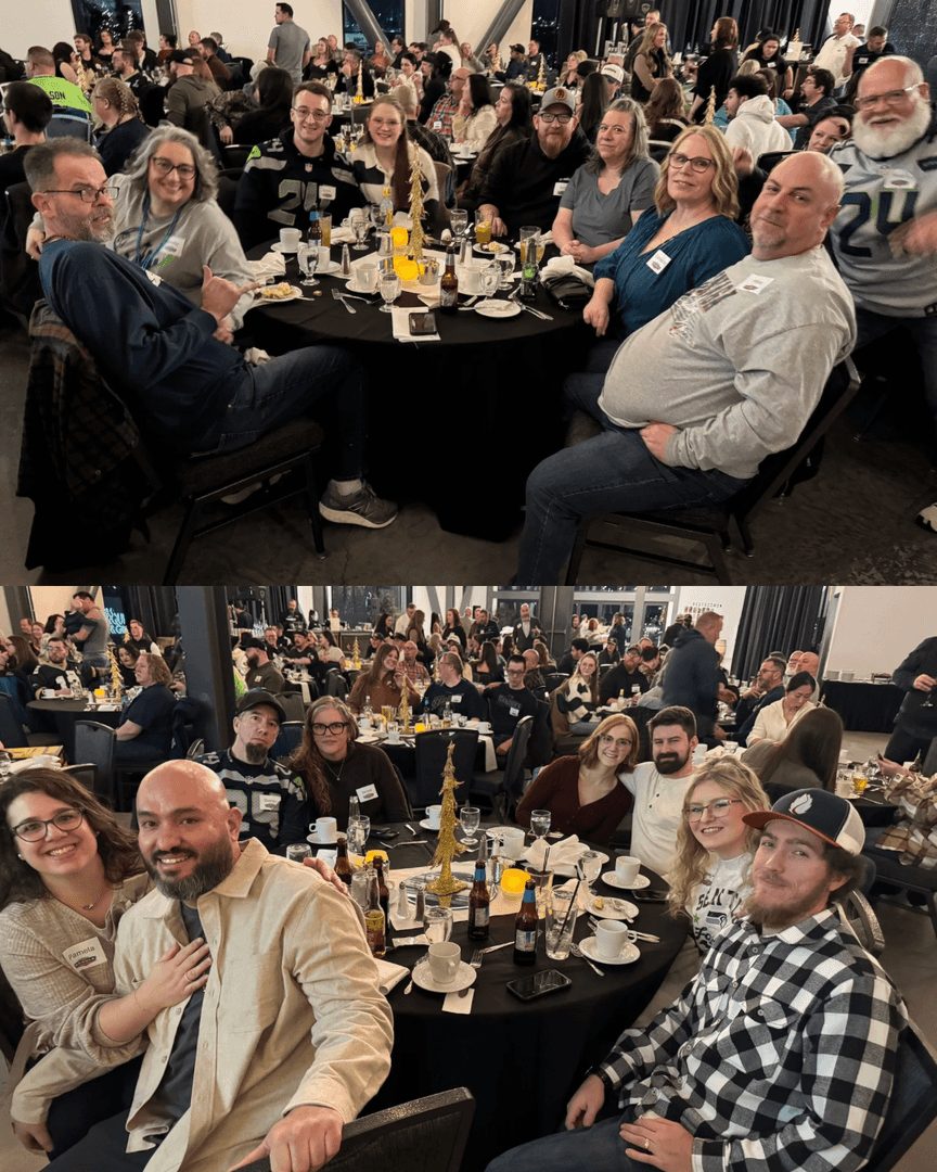 Wendle team members celebrating at the annual company Christmas party, enjoying dinner together.
