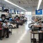 chevrolet-service-center-with-technicians-performing-brake-repairs