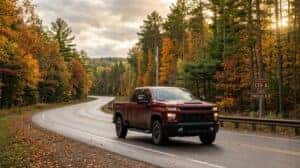 Chevrolet truck on a northern Wisconsin rural highway near Tomahawk heading toward Merrill for brake inspection service