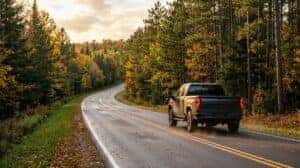 Chevrolet truck driving north on US Highway 51 past Rib Mountain toward Merrill Wisconsin for dealer oil change service