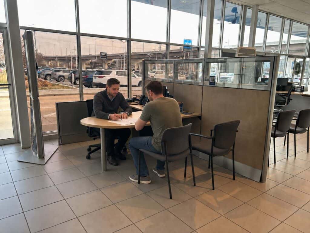Customer discussing Chevy financing options with a finance specialist in Omaha, Nebraska