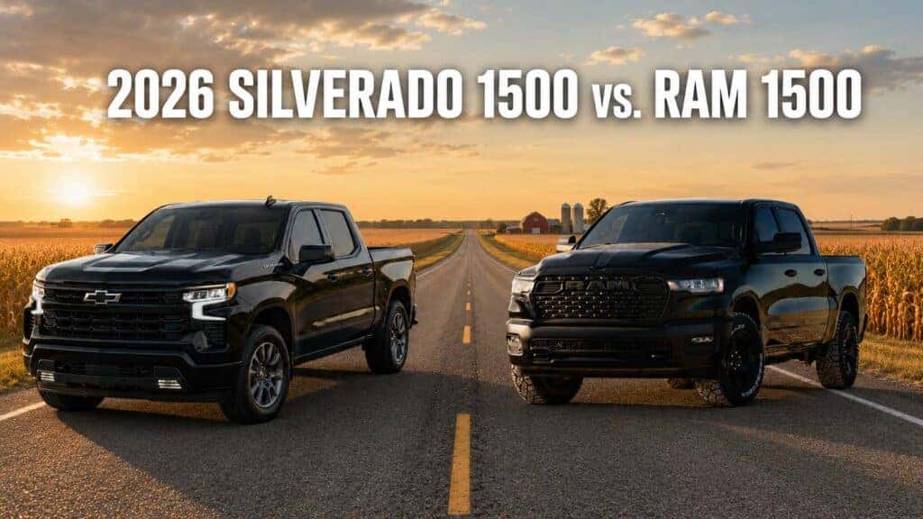 2026 Chevy Silverado 1500 and RAM 1500 compared on a Nebraska highway surrounded by farmland.